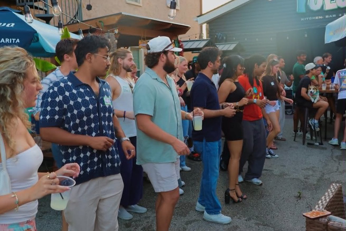 A crowd gathered on the Tulum patio