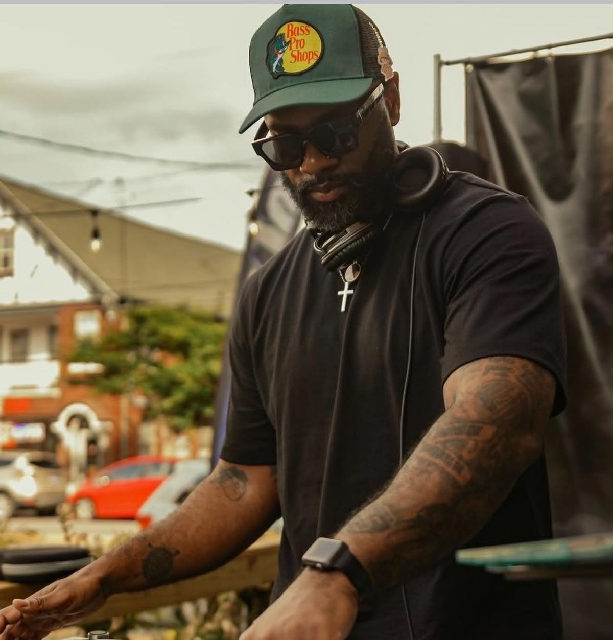 A DJ performing outside at a Cincinnati DJ Battles event