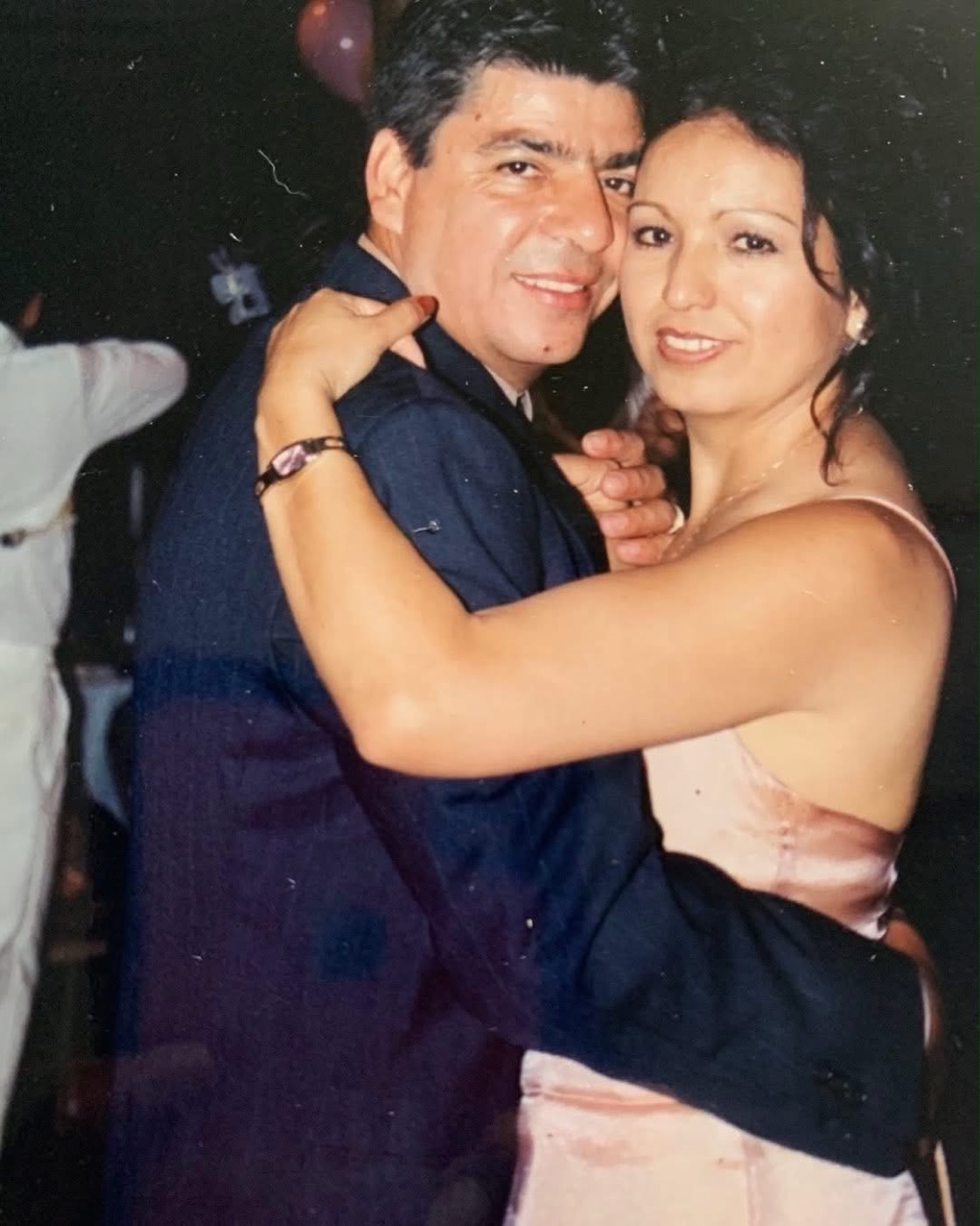Ritchie Arana's parents, including his mother Lucila, dancing together
